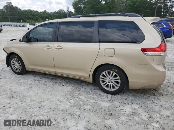 2011 Toyota Sienna XLE AAS с VIN 5TDYK3DC8BS106182, выставлен на аукционе Copart как лот 57728465 с пробегом 168 468 миль миль и Списание • Salvage title. История ставок и продаж доступна на DreamBid. Изображение 2.