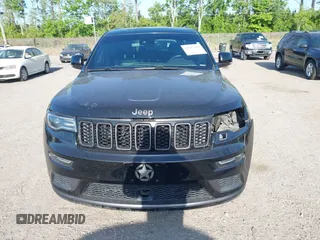 2018 Jeep Grand Cherokee Overland z VIN 1C4RJFCG9JC236856, wystawiony jako IAAI lot #42117905 z przebiegiem 109 330 mil mil oraz . Historia ofert i sprzedaży dostępna na DreamBid. Obrazek 12.