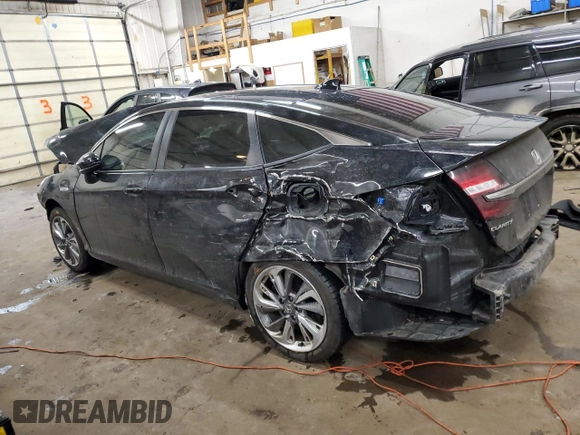 2018 Honda Clarity z VIN JHMZC5F13JC012248, wystawiony jako Copart lot #88791975 z przebiegiem 132 090 mil mil oraz Nie do naprawy • Non repairable. Historia ofert i sprzedaży dostępna na DreamBid. Obrazek 2.