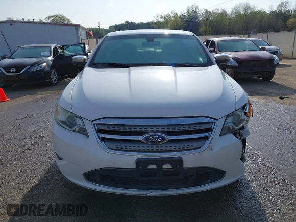 2012 Ford Taurus Limited z VIN 1FAHP2FW1CG103595, wystawiony jako IAAI lot #41913906 z przebiegiem 308 496 mil mil oraz . Historia ofert i sprzedaży dostępna na DreamBid. Obrazek 12.