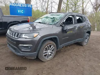 2018 Jeep Compass Altitude with VIN 3C4NJDBB3JT161844, listed as a IAAI auction lot 41935924 with 80,342 mi miles and . Bid and sale history available at DreamBid. Image 2.