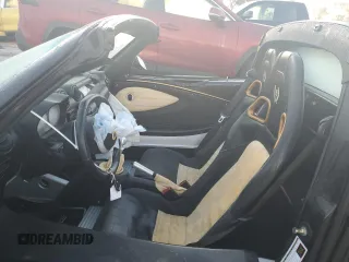 2007 Lotus Elise z VIN SCCPC11107HL33067, wystawiony jako Copart lot #83812274 z przebiegiem Nie podano mil oraz Szkody całkowita. Historia ofert i sprzedaży dostępna na DreamBid. Obrazek 7.