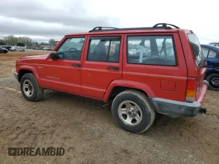 1999 Jeep Cherokee Sport with VIN 1J4FT68S2XL580915, listed as a Copart auction lot 50374875 with 286,276 mi miles and Salvage Title. Bid and sale history available at carsss.com. Image 2.