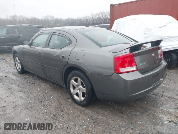 2009 Dodge Charger SXT with VIN 2B3KA33V59H573761, listed as a IAAI auction lot 41545196 with 172,065 mi miles and . Bid and sale history available at carsss.com. Image 3.