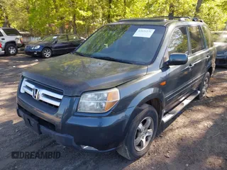 2006 Honda Pilot EX-L with VIN 2HKYF18586H556169, listed as a IAAI auction lot 42031231 with 260,963 mi miles and . Bid and sale history available at DreamBid. Image 2.