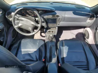 1999 Porsche Boxster с VIN WP0CA2981XU626335, выставлен на аукционе Copart как лот 58570495 с пробегом 140 751 миль миль и Списание • Salvage title. История ставок и продаж доступна на DreamBid. Изображение 8.