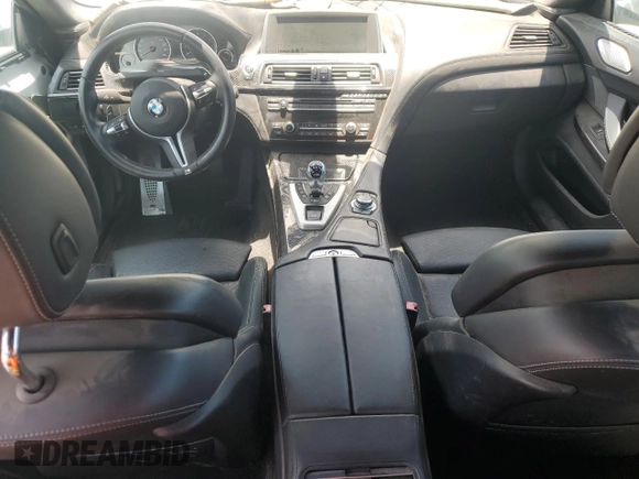 2014 BMW M6 with VIN WBS6C9C55ED467226, listed as a Copart auction lot 61779015 with Not provided miles and Salvage title. Bid and sale history available at DreamBid. Image 8.