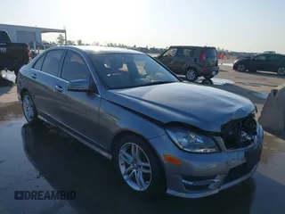 2014 Mercedes-Benz C 250 Sport with VIN WDDGF4HB0EG238946, listed as a IAAI auction lot 41973753 with 116,694 mi miles and . Bid and sale history available at DreamBid. Image 1.