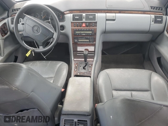 1998 Mercedes-Benz E with VIN WDBJF70F6WA643471, listed as a Copart auction lot 77189934 with 251,579 mi miles and Clean Title. Bid and sale history available at DreamBid. Image 8.