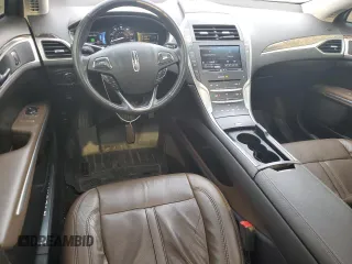 2014 Lincoln MKZ Hybrid z VIN 3LN6L2LU5ER823084, wystawiony jako Copart lot #59597565 z przebiegiem 126 402 mil mil oraz Szkoda całkowita • Salvage title. Historia ofert i sprzedaży dostępna na DreamBid. Obrazek 8.