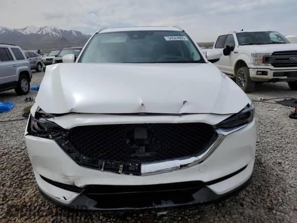 2018 Mazda CX-5 Grand Touring with VIN JM3KFBDM9J0468463, listed as a Copart auction lot 54524805 with 73,389 mi miles and Salvage Title. Bid and sale history available at DreamBid. Image 5.