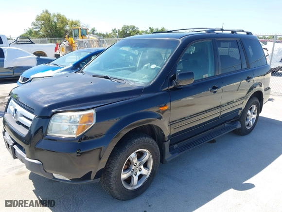 2006 Honda Pilot EX-L with VIN 2HKYF18566H554131, listed as a IAAI auction lot 42014554 with 187,765 mi miles. Bid and sale history available at carsss.com. Image 2.