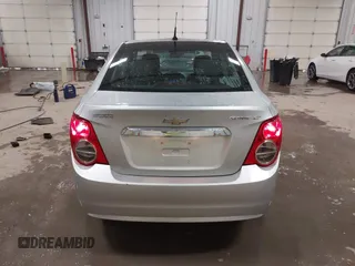 2014 Chevrolet Sonic LT with VIN 1G1JC5SG8E4107664, listed as a IAAI auction lot 41614306 with 128,946 mi miles and . Bid and sale history available at DreamBid. Image 16.