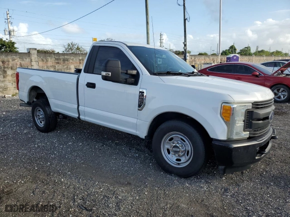 2017 Ford Super Duty F-250 SRW XL with VIN 1FTBF2A68HEB56355, listed as a Copart auction lot 77892084 with 142,921 mi miles and Salvage Title. Bid and sale history available at carsss.com. Image 4.
