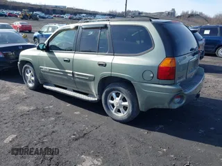 2004 GMC Envoy SLE with VIN 1GKDT13S942254932, listed as a IAAI auction lot 41509407 with 213,068 mi miles. Bid and sale history available at carsss.com. Image 3.