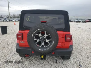 2018 Jeep Wrangler Rubicon with VIN 1C4HJXCG9JW255648, listed as a Copart auction lot 87134384 with Not provided miles and Salvage title. Bid and sale history available at DreamBid. Image 6.