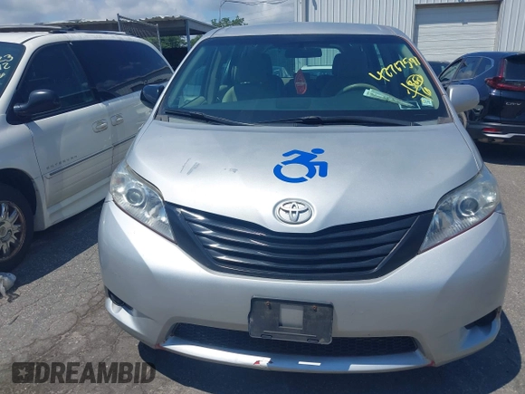 2014 Toyota Sienna L with VIN 5TDZK3DC9ES518653, listed as a IAAI auction lot 42767591 with 261,730 mi miles and . Bid and sale history available at DreamBid. Image 12.