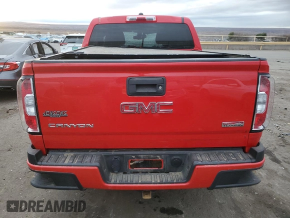 2015 GMC Canyon 4WD SLE with VIN 1GTG6BE30F1136918, listed as a Copart auction lot 82442884 with 102,361 mi miles and Salvage Title. Bid and sale history available at carsss.com. Image 6.