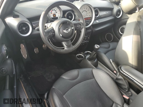 2013 MINI Coupe S z VIN WMWSX3C51DT409008, wystawiony jako Copart lot #82781914 z przebiegiem 122 465 mil mil oraz Czysty tytuł • Clean title. Historia ofert i sprzedaży dostępna na DreamBid. Obrazek 8.