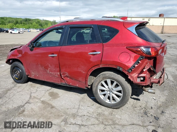 2015 Mazda CX-5 Sport with VIN JM3KE4BY9F0479748, listed as a Copart auction lot 58847805 with 122,698 mi miles and Salvage title. Bid and sale history available at DreamBid. Image 2.
