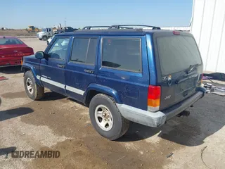 2001 Jeep Cherokee Sport with VIN 1J4FT48S01L522281, listed as a IAAI auction lot 41999570 with 261,698 mi miles and . Bid and sale history available at DreamBid. Image 3.