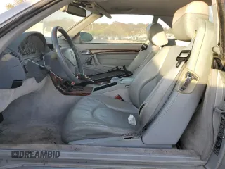 1999 Mercedes-Benz SL-Class with VIN WDBFA68F7XF178125, listed as a Copart auction lot 77404164 with 0 mi miles and Clean Title. Bid and sale history available at carsss.com. Image 7.