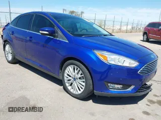 2015 Ford Focus Titanium with VIN 1FADP3J25FL314903, listed as a IAAI auction lot 42053132 with 125,418 mi miles and . Bid and sale history available at carsss.com. Image 1.