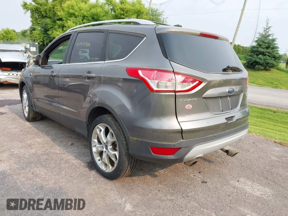 2013 Ford Escape Titanium with VIN 1FMCU9J96DUD74870, listed as a IAAI auction lot 42415332 with 178,651 mi miles and . Bid and sale history available at DreamBid. Image 3.