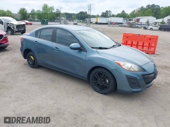 2011 Mazda Mazda3 i Sport with VIN JM1BL1UF9B1465202, listed as a IAAI auction lot 42119001 with 122,198 mi miles. Bid and sale history available at carsss.com. Image 1.