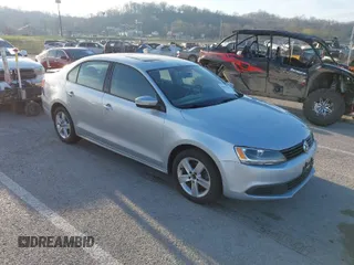 2012 Volkswagen Jetta TDI w/Premium with VIN 3VWLL7AJ1CM420210, listed as a IAAI auction lot 41859294 with 136,564 mi miles and . Bid and sale history available at DreamBid. Image 1.