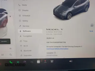 2023 Tesla Model Y Long Range with VIN 7SAYGAEE8PF667728, listed as a IAAI auction lot 41839771 with 32,654 mi miles and . Bid and sale history available at DreamBid. Image 7.