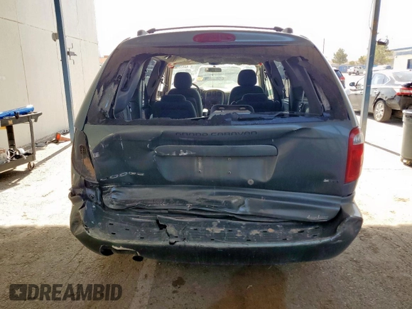 2005 Dodge Caravan SXT with VIN 2D4GP44L75R335536, listed as a Copart auction lot 60933985 with 212,231 mi miles and Salvage title. Bid and sale history available at DreamBid. Image 6.