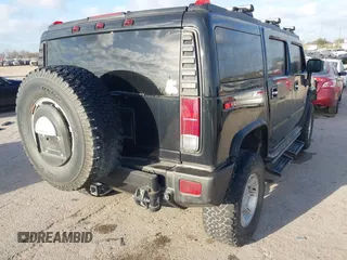 2006 Hummer H2 with VIN 5GRGN23U96H116719, listed as a IAAI auction lot 41781406 with 175,118 mi miles. Bid and sale history available at carsss.com. Image 4.