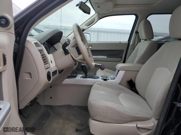 2009 Mercury Mariner with VIN 4M2CU81759KJ06063, listed as a Copart auction lot 85241434 with 118,191 mi miles and Non Repairable. Bid and sale history available at carsss.com. Image 7.