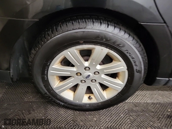 2011 Ford Taurus Limited with VIN 1FAHP2FW0BG147778, listed as a IAAI auction lot 42666687 with 283,665 mi miles and . Bid and sale history available at DreamBid. Image 15.