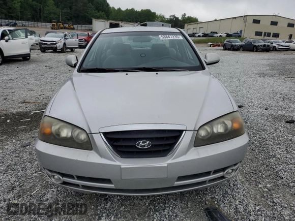 2004 Hyundai Elantra GLS z VIN KMHDN46D34U859307, wystawiony jako Copart lot #53847235 z przebiegiem 91 939 mil mil oraz Szkoda całkowita • Salvage title. Historia ofert i sprzedaży dostępna na DreamBid. Obrazek 5.