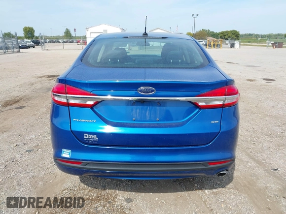 2017 Ford Fusion SE z VIN 3FA6P0H78HR195208, wystawiony jako IAAI lot #40384232 z przebiegiem 166 927 mil mil oraz . Historia ofert i sprzedaży dostępna na DreamBid. Obrazek 16.