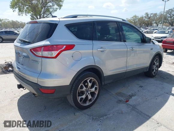 2014 Ford Escape Titanium с VIN 1FMCU0J9XEUB93591, выставлен на аукционе IAAI как лот 41721869 с пробегом 98 859 миль миль и . История ставок и продаж доступна на DreamBid. Изображение 4.