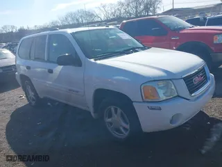 2005 GMC Envoy SLE with VIN 1GKDS13S852141073, listed as a IAAI auction lot 41600869 with 1 mi miles. Bid and sale history available at carsss.com. Image 1.