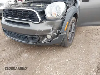 2014 MINI Countryman S with VIN WMWZC3C55EWT00349, listed as a IAAI auction lot 41738181 with 133,662 mi miles and . Bid and sale history available at DreamBid. Image 6.