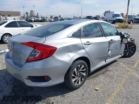 2016 Honda Civic Sedan EX with VIN 2HGFC2F74GH563268, listed as a IAAI auction lot 41805038 with 125,577 mi miles. Bid and sale history available at carsss.com. Image 4.