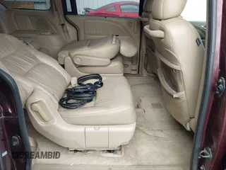 2007 Honda Odyssey EX-L z VIN 5FNRL387X7B416523, wystawiony jako IAAI lot #42245359 z przebiegiem 224 645 mil mil oraz . Historia ofert i sprzedaży dostępna na DreamBid. Obrazek 8.