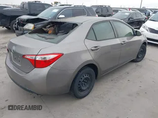 2015 Toyota Corolla L z VIN 5YFBURHE4FP294082, wystawiony jako IAAI lot #41681915 z przebiegiem 81 559 mil mil oraz . Historia ofert i sprzedaży dostępna na DreamBid. Obrazek 4.