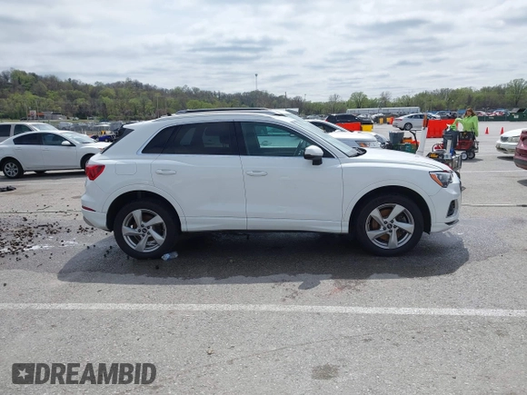 2021 Audi Q3 Premium with VIN WA1AUCF33M1096437, listed as a IAAI auction lot 41910411 with 86,837 mi miles and . Bid and sale history available at DreamBid. Image 14.