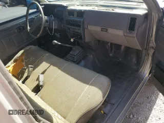 1987 Nissan Hardbody E z VIN JN6ND11SXHW014073, wystawiony jako Copart lot #78956934 z przebiegiem 381 885 mil mil oraz Szkody całkowita. Historia ofert i sprzedaży dostępna na DreamBid. Obrazek 8.