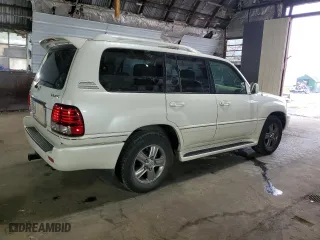 2006 Lexus LX 470 with VIN JTJHT00W464015842, listed as a Copart auction lot 66004384 with 104,402 mi miles and Salvage Title. Bid and sale history available at carsss.com. Image 3.
