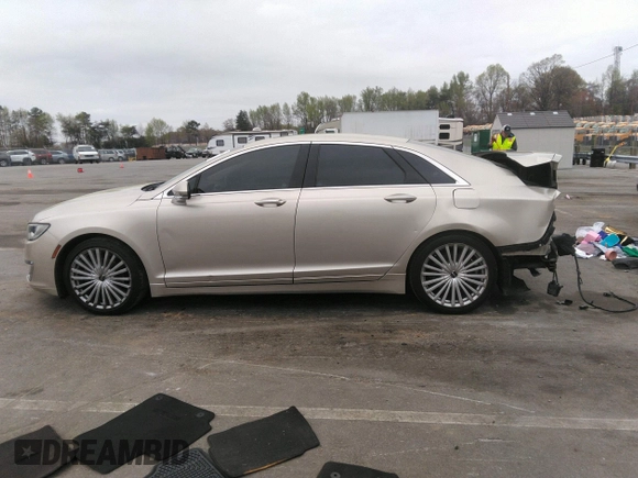 2017 Lincoln MKZ Reserve z VIN 3LN6L5E94HR615115, wystawiony jako IAAI lot #41947698 z przebiegiem 122 090 mil mil oraz . Historia ofert i sprzedaży dostępna na DreamBid. Obrazek 15.