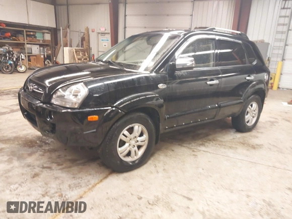 2007 Hyundai Tucson SE with VIN KM8JN12D97U636846, listed as a IAAI auction lot 41818368 with 199,996 mi miles. Bid and sale history available at carsss.com. Image 2.