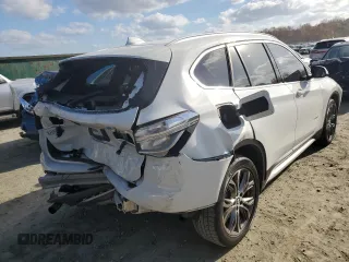 2017 BMW X1 sDrive28i with VIN WBXHU7C38H5H36694, listed as a Copart auction lot 65935442 with 96,213 mi miles. Bid and sale history available at carsss.com. Image 4.