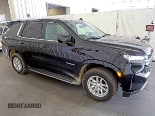 2022 Chevrolet Tahoe LS z VIN 1GNSKMKD7NR129745, wystawiony jako IAAI lot #42566236 z przebiegiem 95 126 mil mil oraz . Historia ofert i sprzedaży dostępna na DreamBid. Obrazek 25.